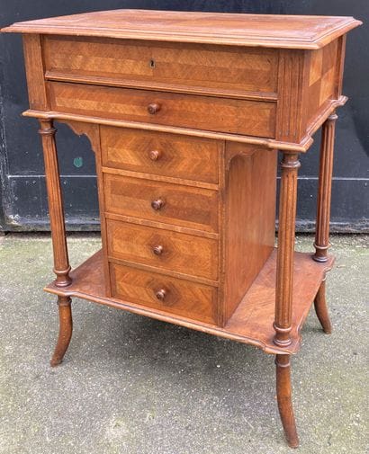 Walnut and walnut veneer work table, the...