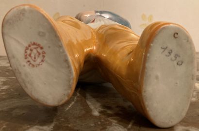 Lustrous polychrome porcelain bottle showing...