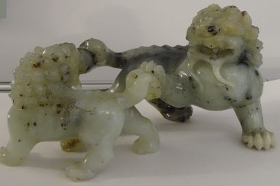 CHINA, 20th century. Set in celadon serpentine:...