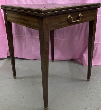 Game table in mahogany with brass moulding,...
