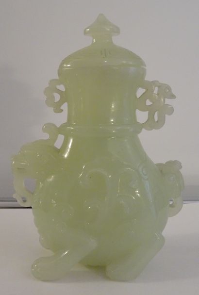 CHINA, 20th century. Set in celadon serpentine:...