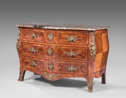 Chest of drawers curved on all sides in wood...