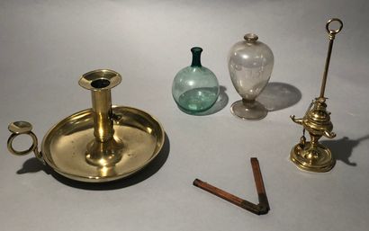 Trinkets: a small folding ruler; a miniature...