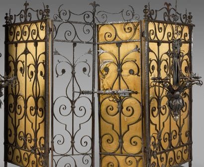 Pair of wrought iron and cut iron interior...