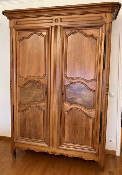 Cabinet in molded fruitwood, the doors with...