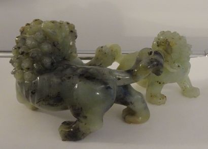 CHINA, 20th century. Set in celadon serpentine:...