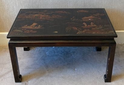 
Small lacquer coffee table, the top decorated...