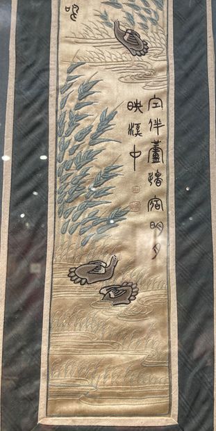 Set of three embroidered silk panels: one...