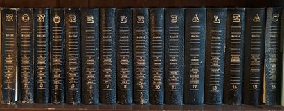 Mannettes of bound and paperback books, including...