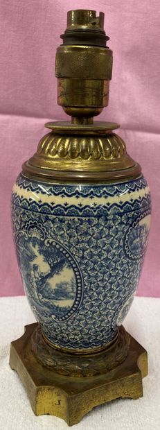 Earthenware ovoid vase decorated in blue...
