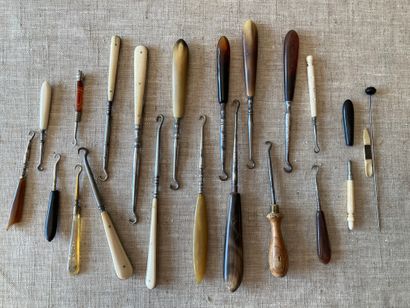 Set of small boot pullers with handles in...