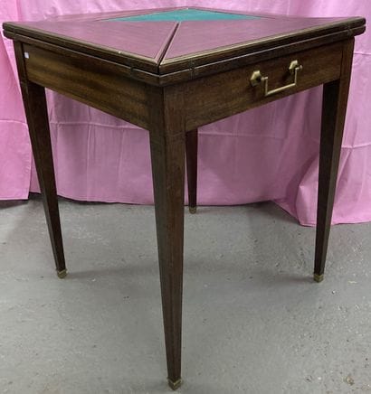 Game table in mahogany with brass moulding,...