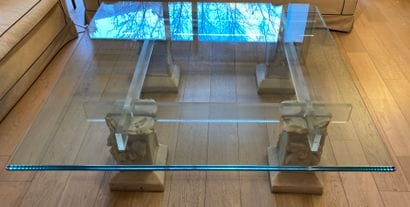 
Coffee table, the top in glass slab, the...
