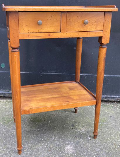 Varnished cherry wood bedside table, the...