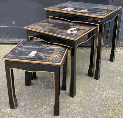 
Suite of three nesting tables in lacquer...