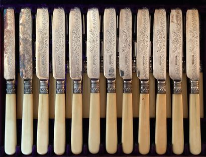 Suite of twelve forks and twelve fruit knives,...