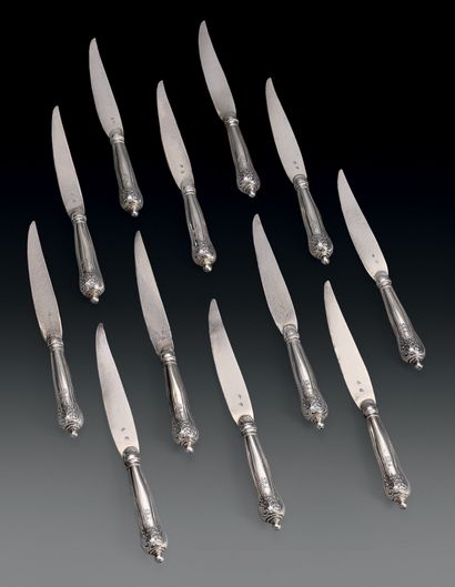 Twelve silver dessert knives, (formerly gilt),...