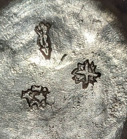 Small oval silver snuffbox, the lid with...