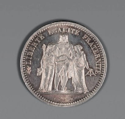 Pièce de cinq francs, 1873, en argent.
Signée...