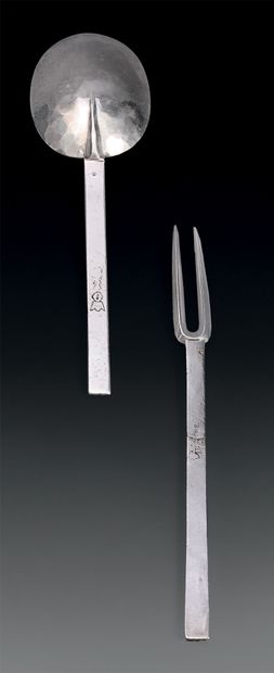 A silver spoon and fork, the handle straight,...