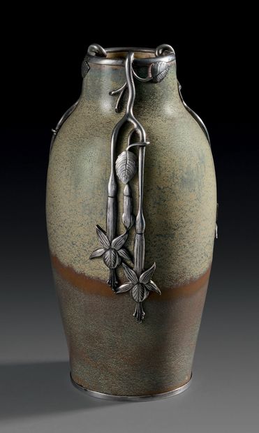 ATELIER DE GLATIGNY.
Vase en grès à décor...