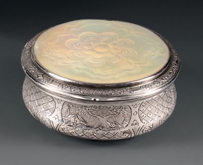 Round silver snuffbox, the hinged lid and...