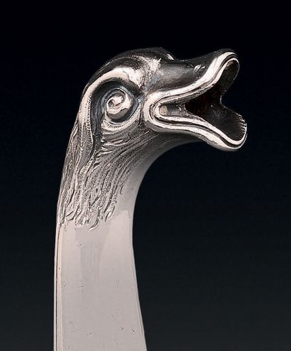 Silver teapot, of baluster form, posed on...