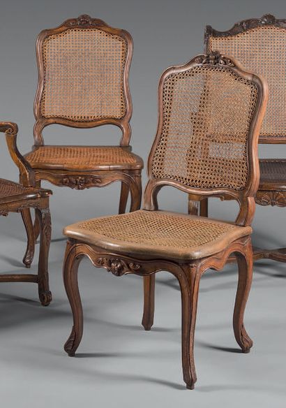 Two chairs in natural wood molded and carved...