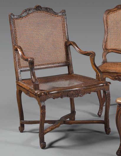 Pair of armchairs in natural wood molded...