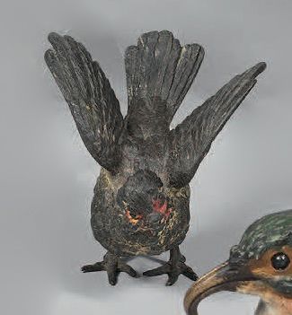 Volatile with spread wings. H. : 6,3 cm....