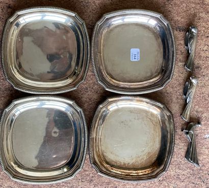 Suite of four coasters in silver plated metal,...