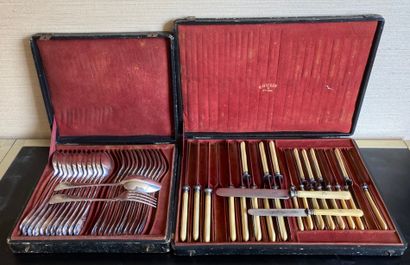 Twelve spoons and eleven forks out of silver...