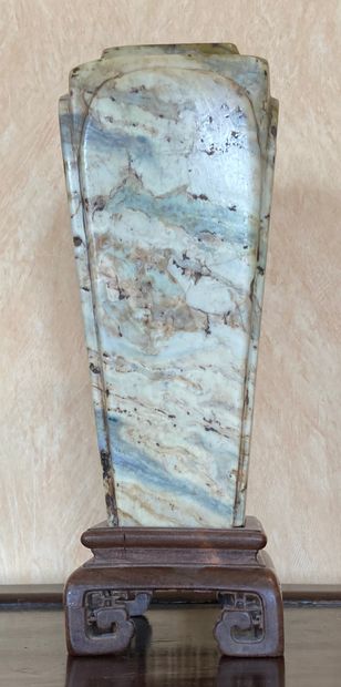 Urn in blue, green, ochre and beige veined...