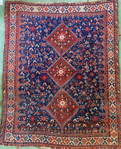 
Oriental wool carpet with stylized decoration....
