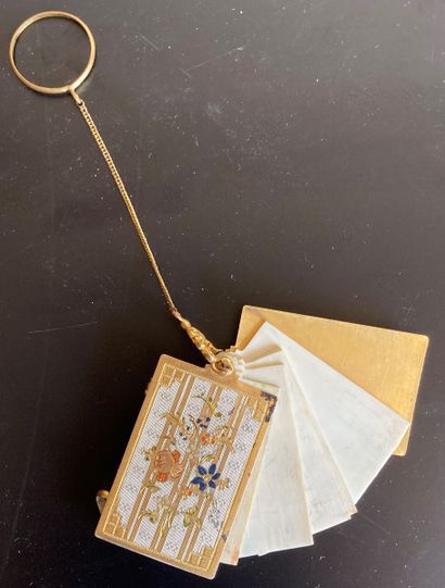 Gilded brass ball book, decorated with flowers...