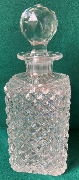 Crystal decanter cut by points of diamonds....