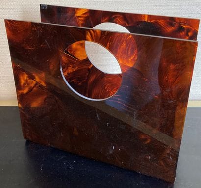
Plexiglass magazine rack in imitation of...