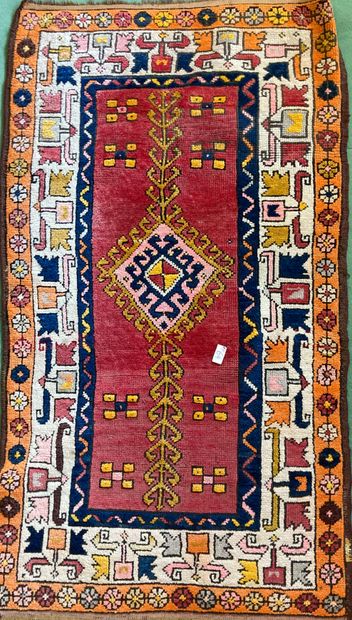 Small oriental wool carpet decorated with...