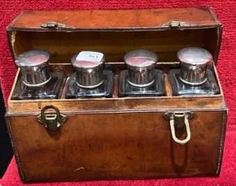 Saddle-stitched leather travel case, containing...
