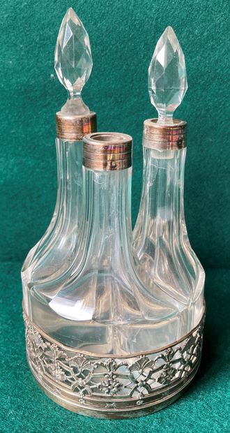 Perfume set, with three curved crystal bottles....
