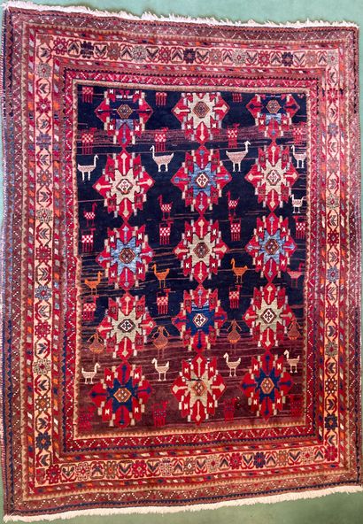 Oriental wool carpet with stylized decoration...