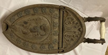 Cast iron coal cart, decorated with foliage,...
