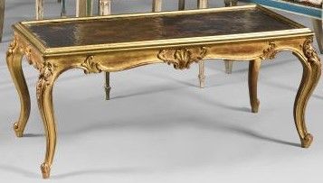 Coffee table, the lacquer top decorated with...