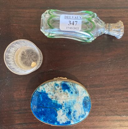 Small trinkets: a pill box, the lid decorated...