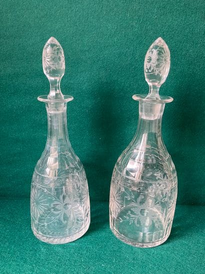 Two crystal decanters of slightly different...
