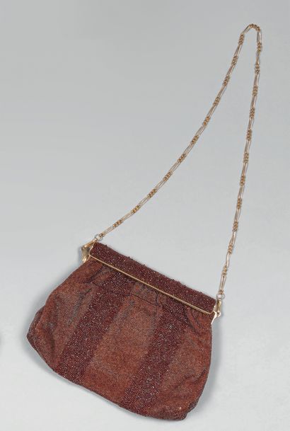 Maison ROXANE.
Evening clutch in brown beaded...