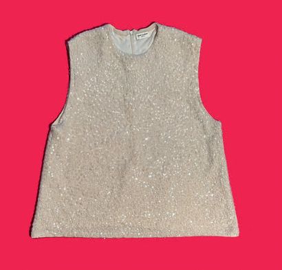 Yves SAINT-LAURENT Paris.
Blouse sans manche...