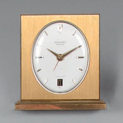HERMES.

Pendulette borne en bronze doré...