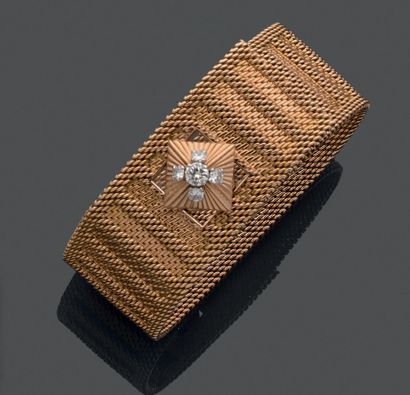 
18K (750) yellow gold bracelet with a braided...