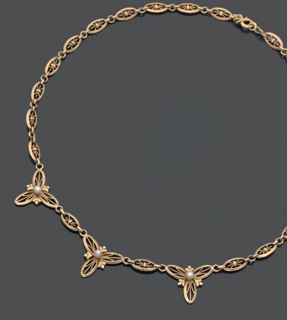Collier draperie en or jaune 18K (750), les...